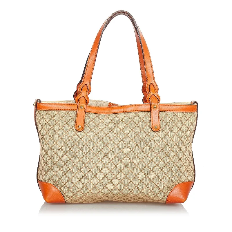 Ladies Gucci Dionysus bags with a star - shaped charmGucci Diamante Craft Canvas Tote Bag