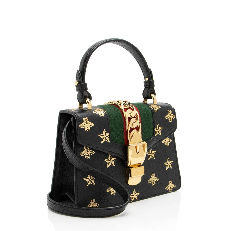 Ladies Gucci handbags with a detachable coin purse insideGucci Calfskin Bee & Star Sylvie Mini Top Handle (JXhbEI)