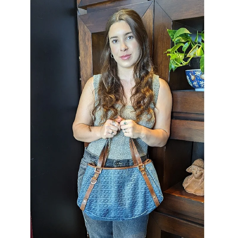 Women Gucci crossbody bags with a woven leather strapGucci GG Blue Denim Abbey Hobo Bag