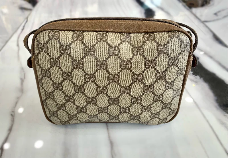 Women Gucci bags with a detachable mirror insideGUCCI MONOGRAM COATED CANVAS VINTAGE CROSSBODY