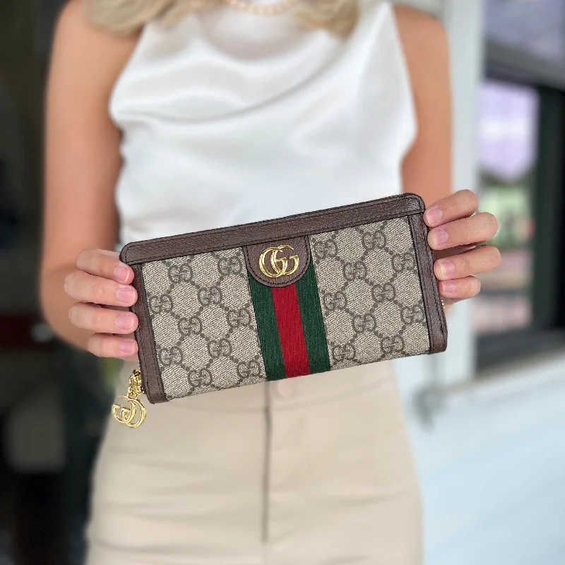 Women Gucci Sylvie bags with a monogram - embossed leatherGucci GG Ophidia Zip Around Wallet