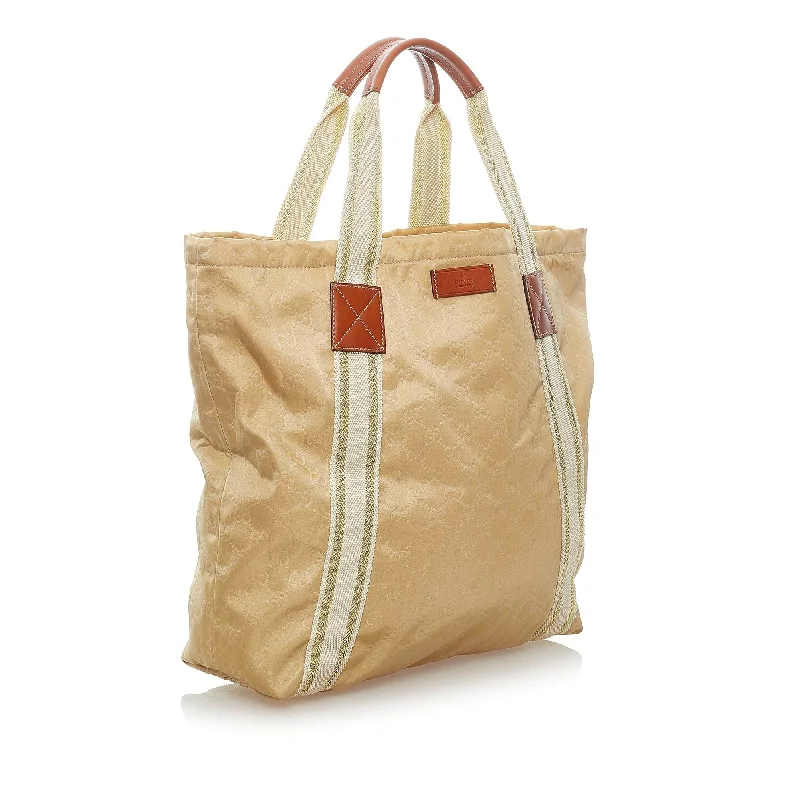 Gucci tote bags for women with a spacious interiorGucci GG Canvas Web Tote Bag (SHG-xK4BGg)