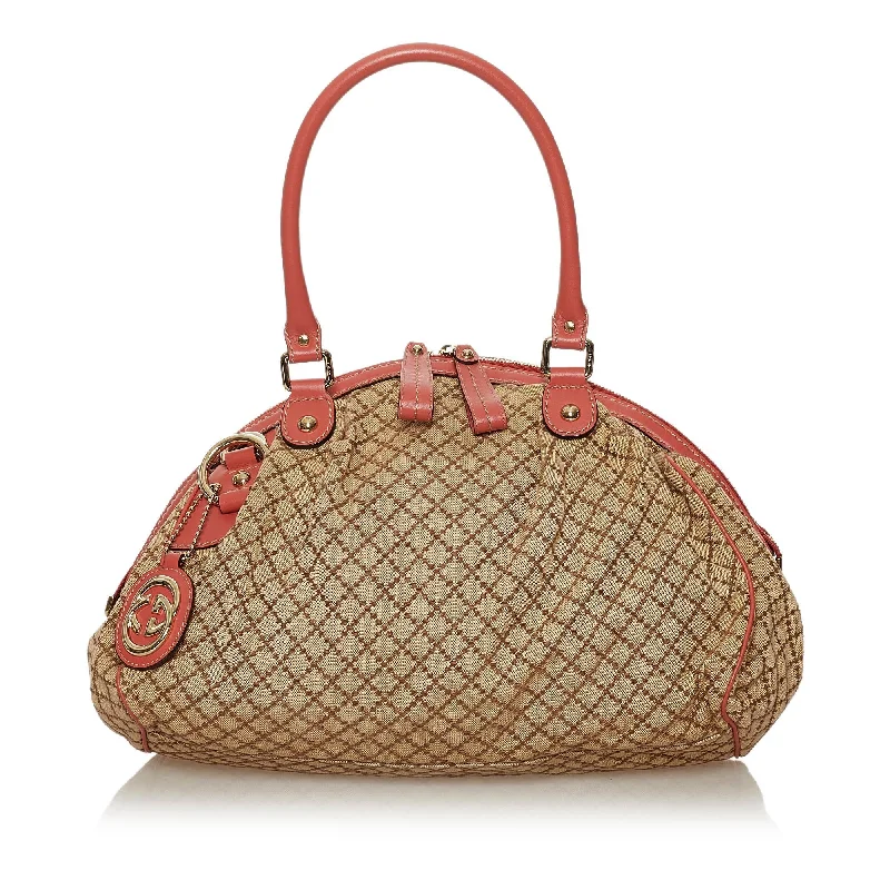 Gucci tote bags for women with a spacious interiorGucci Diamante Sukey Canvas Satchel