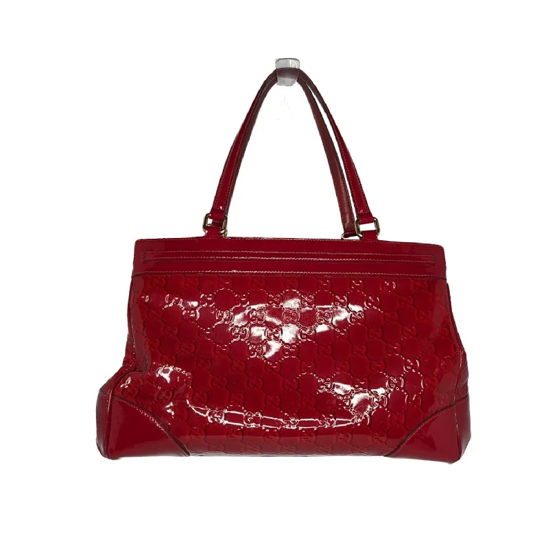 Women Gucci bags with a magnetic snap closure for easy accessGucci Patent Guccissima Medium Mayfair Tote Red