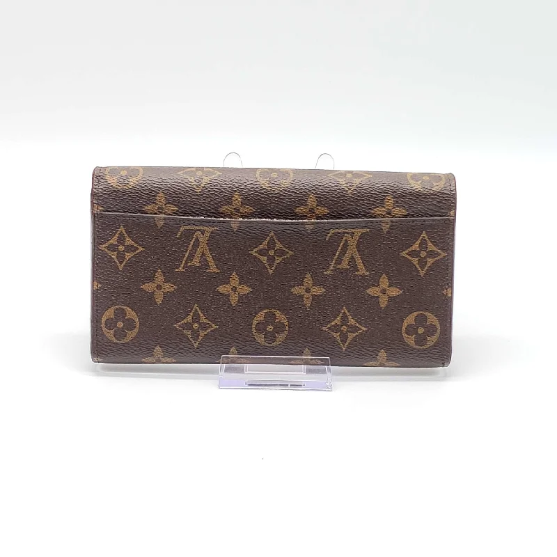 Louis Vuitton bags with a magnetic snap closure for easy accessLouis Vuitton Monogram Portefeiulle Sarah Wallet