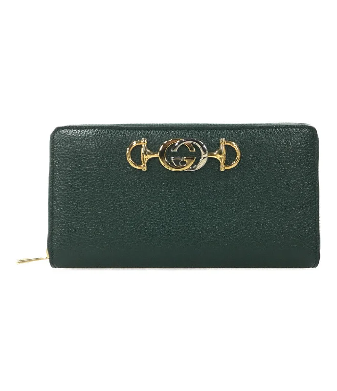 Ladies Gucci handbags with a detachable coin purse insideGucci Dark Green Leather Clutch with Gold Hardware