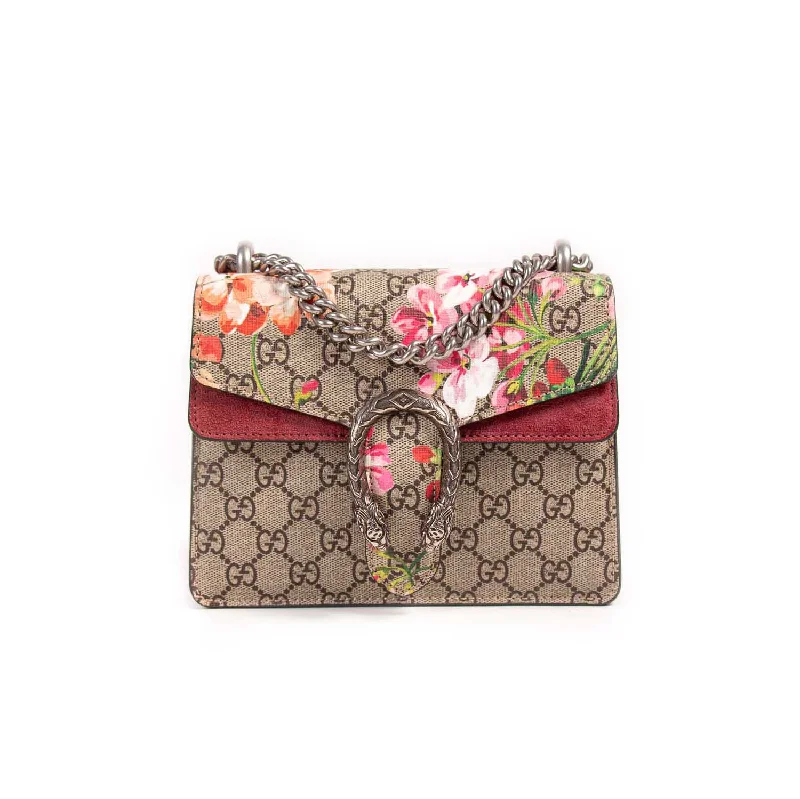 Ladies Gucci Dionysus bags with a star - shaped charmGucci Dionysus Blooms Mini Shoulder Bag