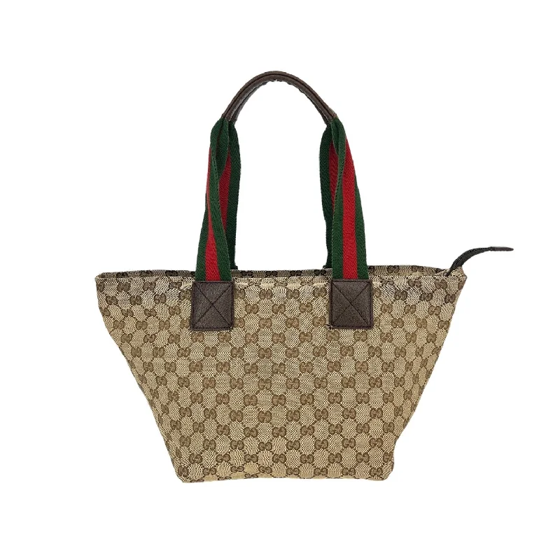 Ladies Gucci handbags with a detachable coin purse insideGucci GG Canvas Medium Web Tote