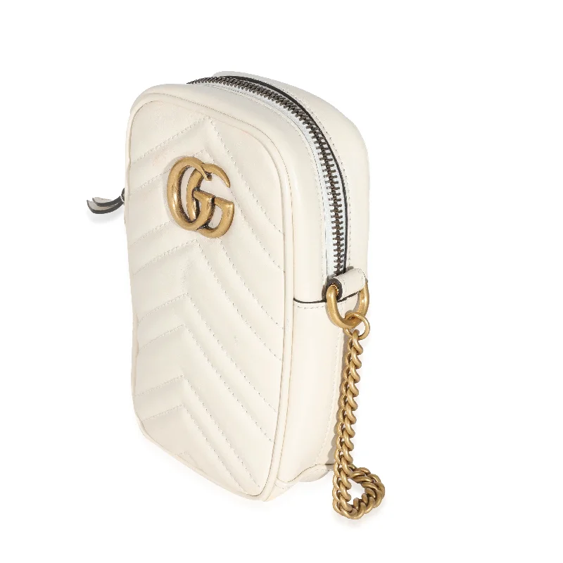 Women Gucci bags with a zippered interior pocketGucci GG Cream Matelassé Marmont Mini Bag