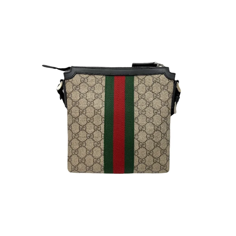 Women Gucci bags with a snap - button closure and a decorative charmGucci GG Canvas Web Messenger Bag