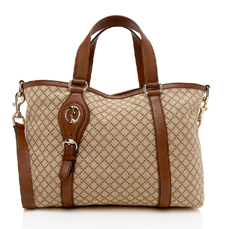 Gucci backpacks for women with a padded laptop compartmentGucci Diamante Canvas Village Tote