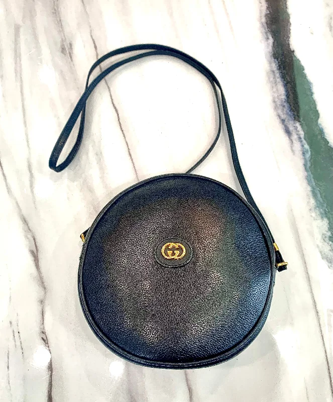 Women Gucci crossbody bags with a printed floral patternGUCCI VINTAGE ROUND CANTEEN-STYLE LEATHER BAG