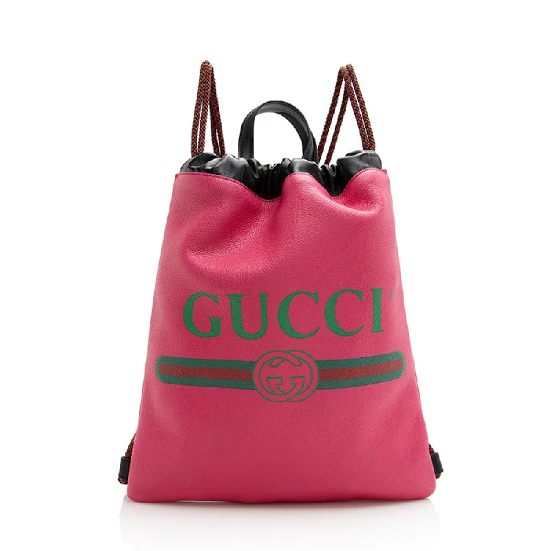 Gucci tote bags for women with a water - resistant coatingGucci Leather Logo Drawstring Backpack