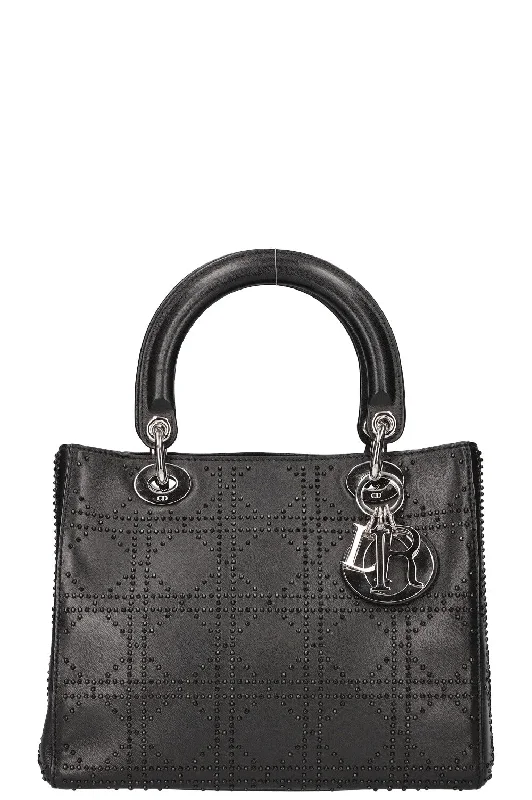 Christian Dior Saddle bags with a patent leather finish for a shiny lookCHRISTIAN DIOR Lady Dior Cannage Studded Black