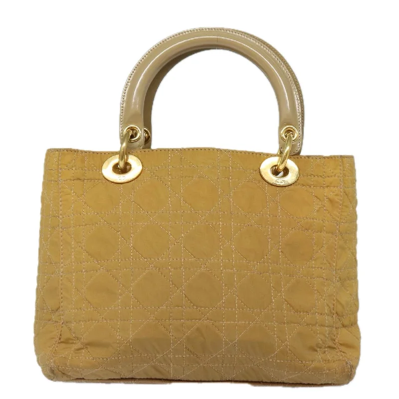 Christian Dior bags with a quilted pattern and gold - toned hardwareCHRISTIAN DIOR Lady Dior Canage Hand Bag Nylon 2way Beige Auth yk13576