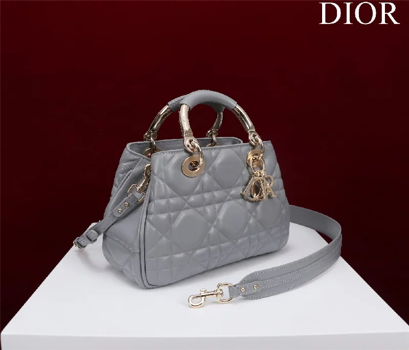 Christian Dior handbags with a snap - button closure and a decorative buckleChristian Dior - Luxury Bags  207